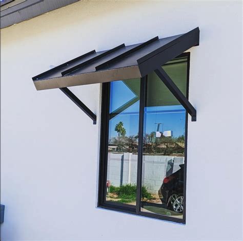 black metal awnings on a cream color house|Metal Black Awnings .